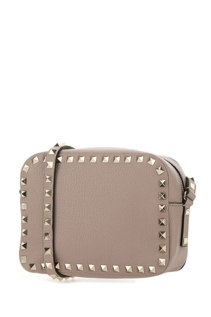 Valentino Garavani Woman Antiqued Pink Leather Rockstud Crossbody Bag