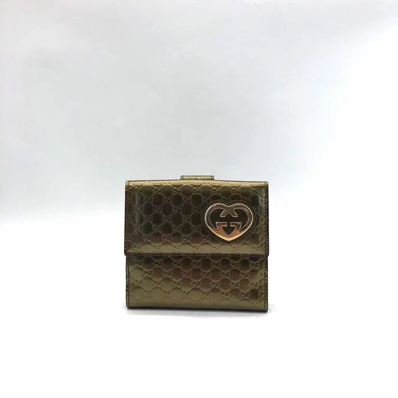 Vintage Gucci Metallic Gold Monogram Wallet With Heart Logo Detailing