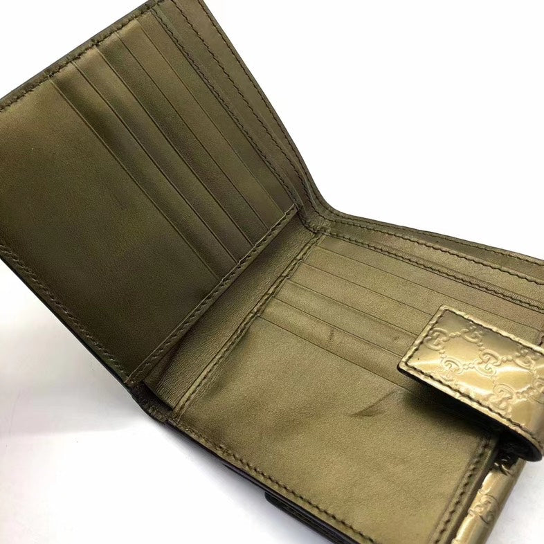 Vintage Gucci Metallic Gold Monogram Wallet With Heart Logo Detailing