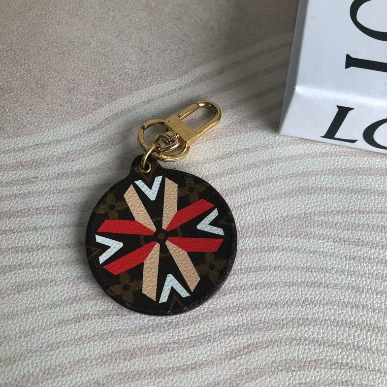 Louis Vuitton Monogram Canvas Bag Charm Brown Red Black Round