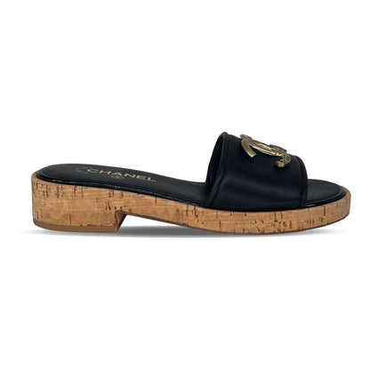 Chanel gold logo mules sandals black lambskin leather/cork